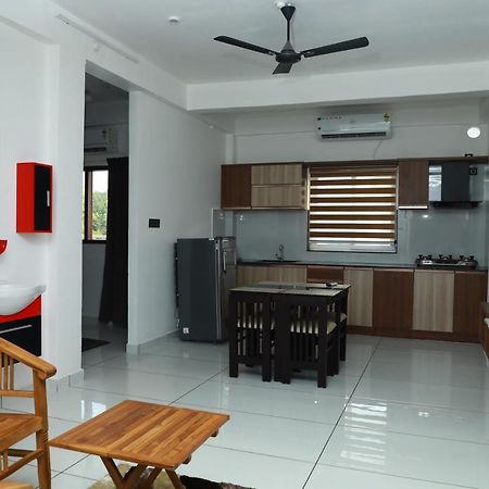 Achoos Residency Hotel Tiruvalla Kültér fotó
