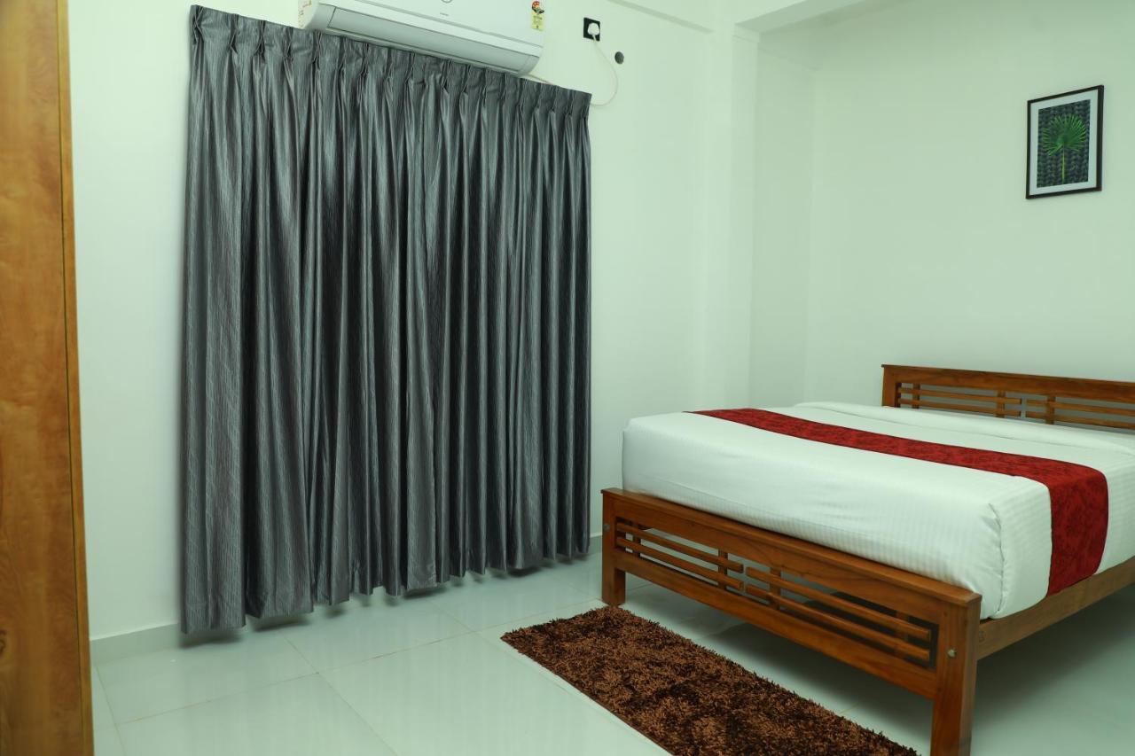 Achoos Residency Hotel Tiruvalla Kültér fotó