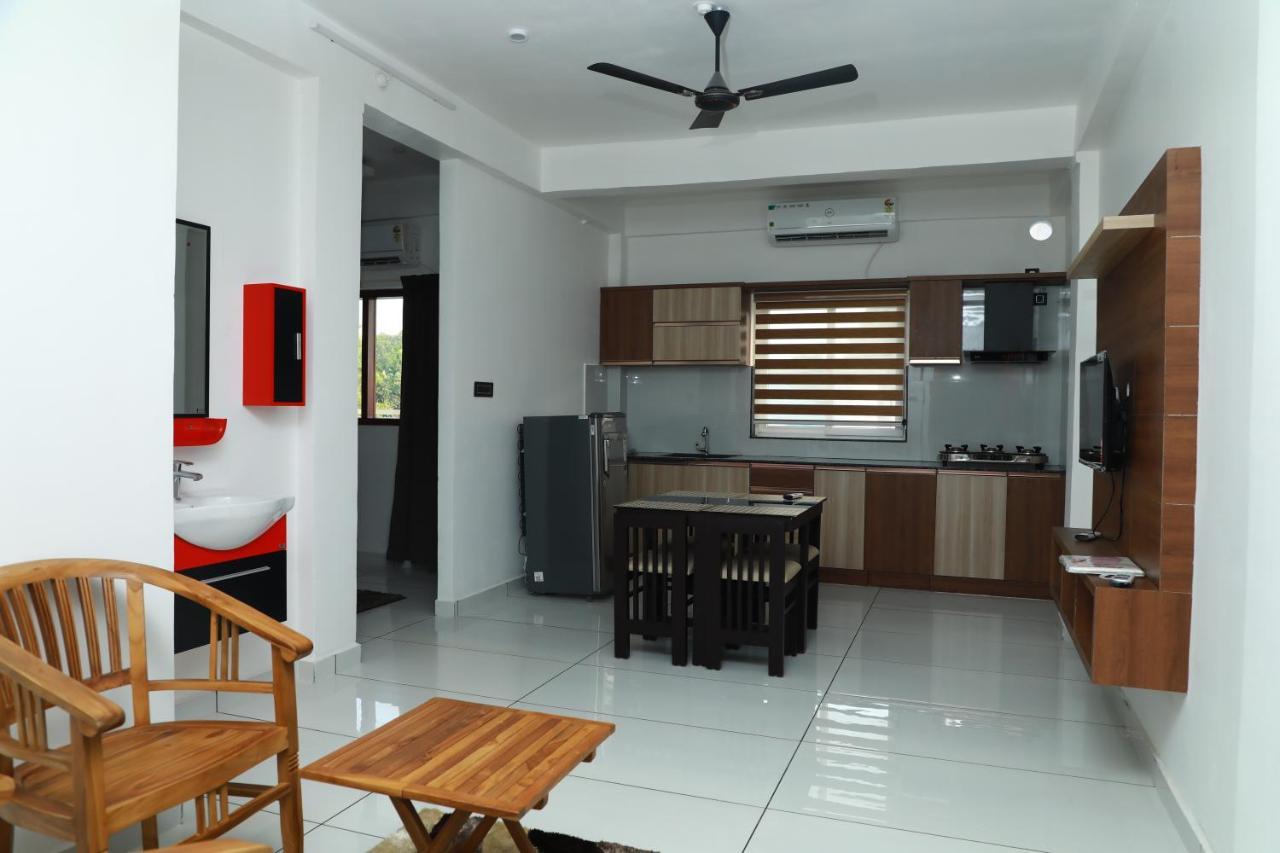 Achoos Residency Hotel Tiruvalla Kültér fotó
