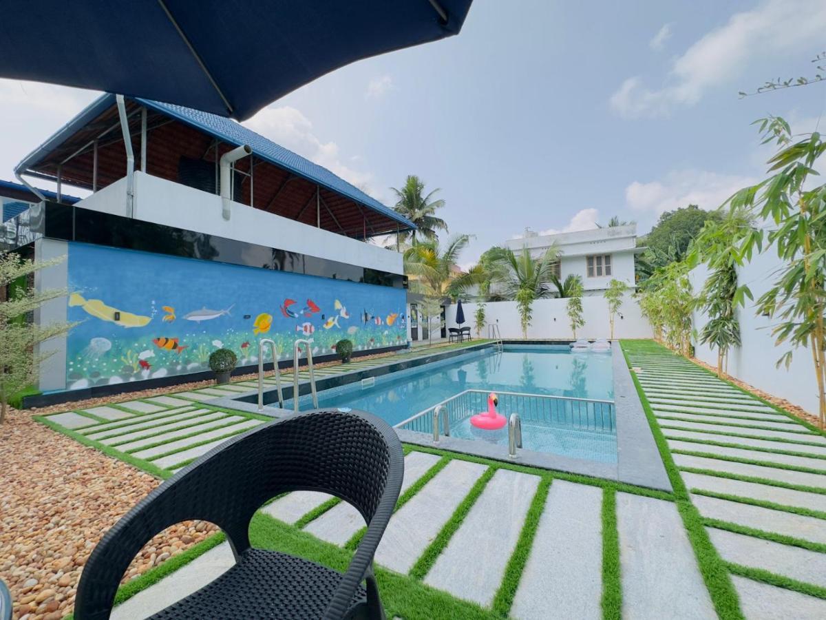 Achoos Residency Hotel Tiruvalla Kültér fotó