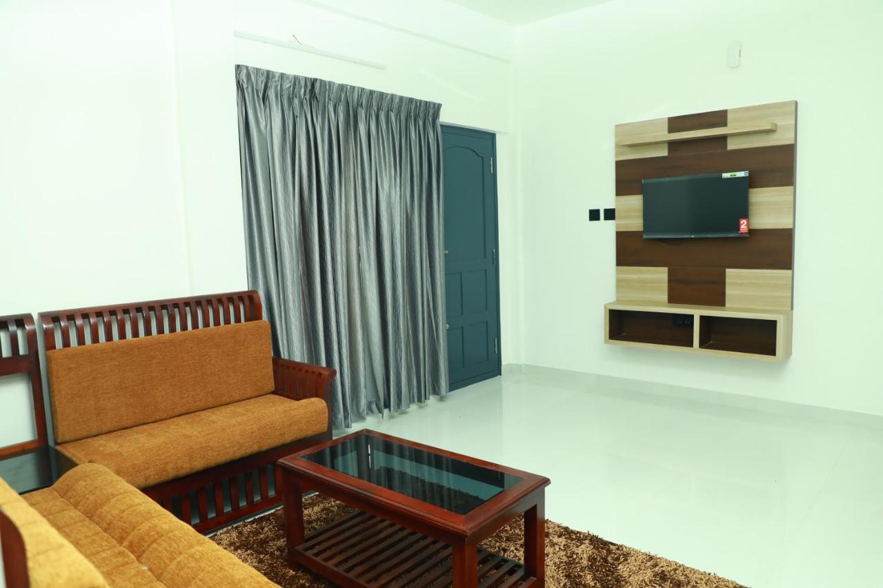 Achoos Residency Hotel Tiruvalla Kültér fotó