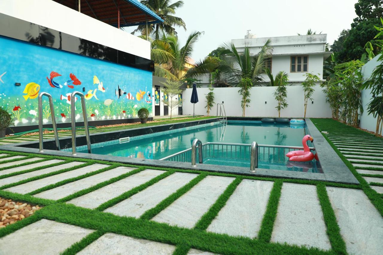 Achoos Residency Hotel Tiruvalla Kültér fotó