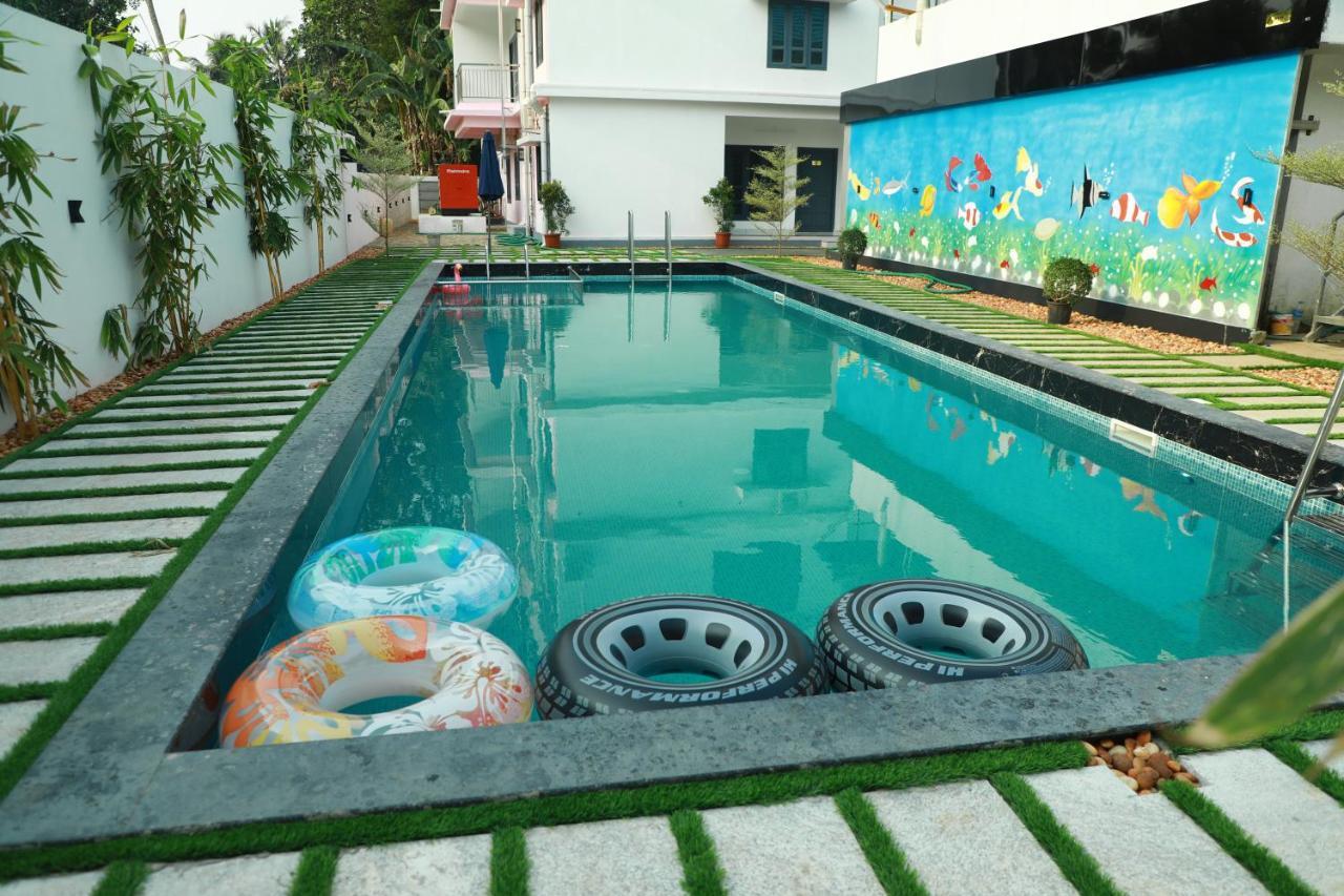 Achoos Residency Hotel Tiruvalla Kültér fotó
